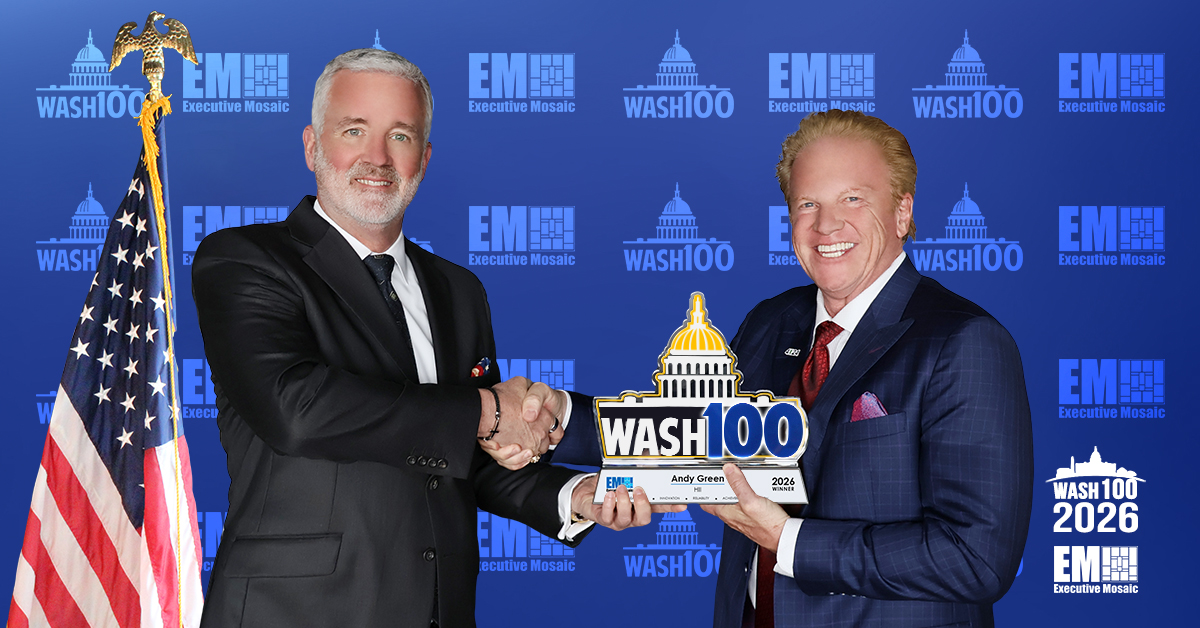 Executive Mosaic CEO Jim Garrettson congratulates Andy Green, executive vice president of HII and president of HII’s Mission Technologies division, for his eighth Wash100 win.