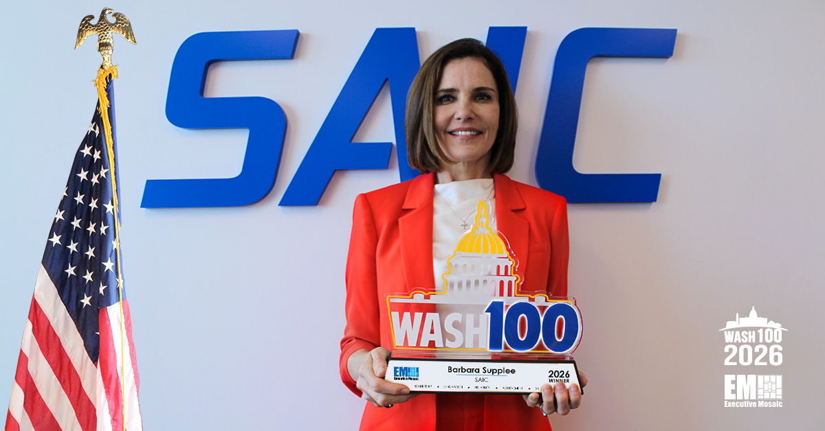 Barbara Supplee, executive vice president of SAIC’s Army Navy Business Group, holding the 2026 Wash100 Award. Supplee is a first-time Wash100 winner.
