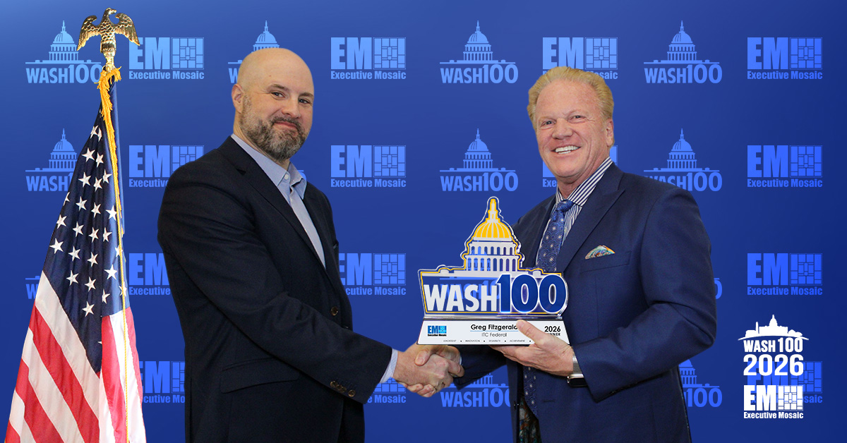 Executive Mosaic CEO Jim Garrettson  congratulates ITC Federal CEO Greg Fitzgerald for his 2026 Wash100 Award.