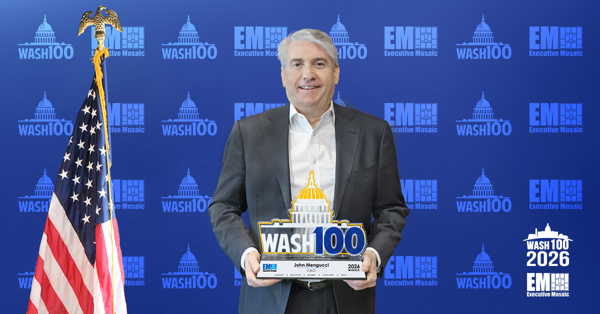 John Mengucci, president and CEO of CACI International, holding the 2026 Wash100 Award.