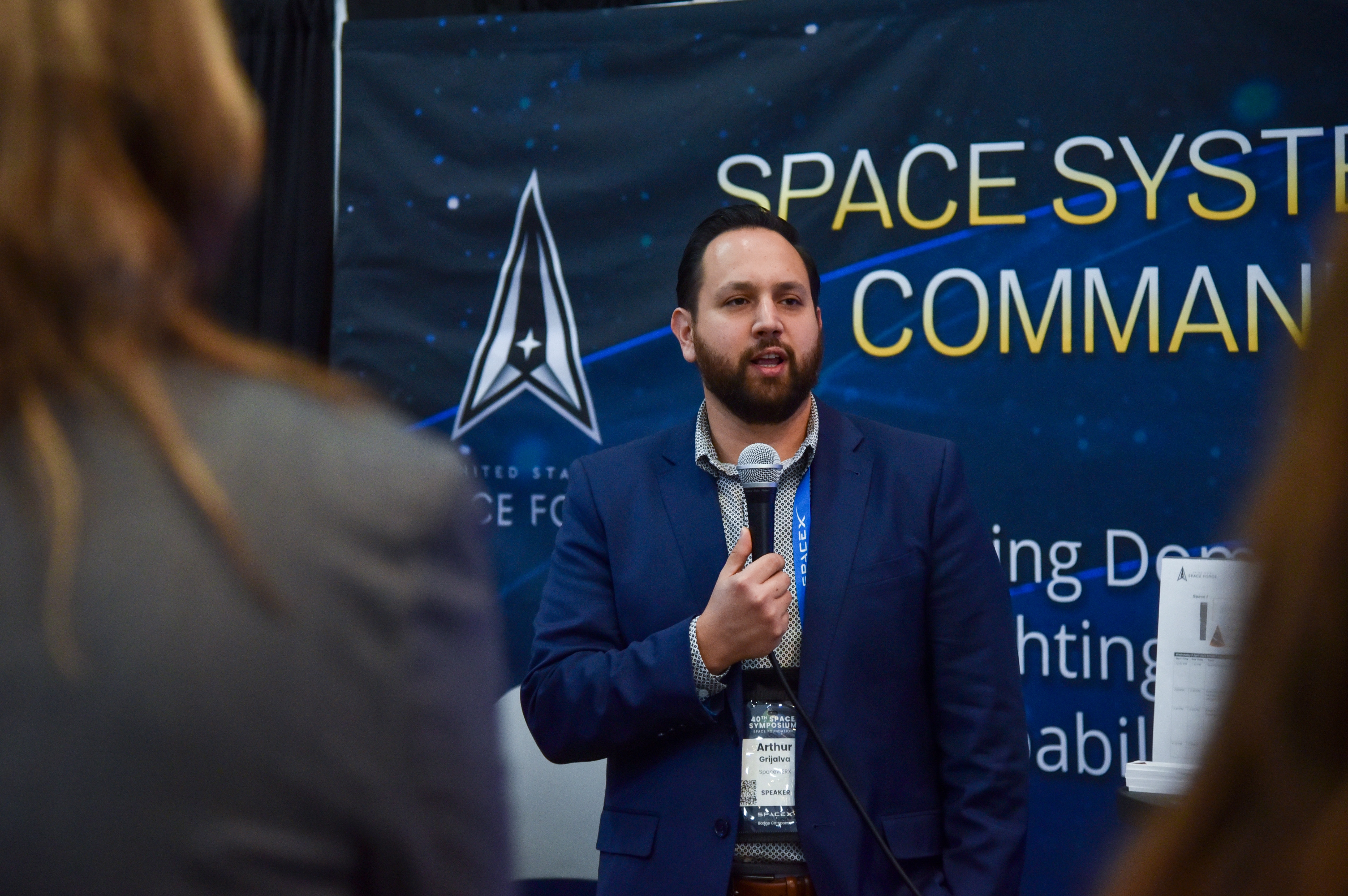 SpaceWERX Director Arthur Grijalva speaks at the 2025 Space Symposium.