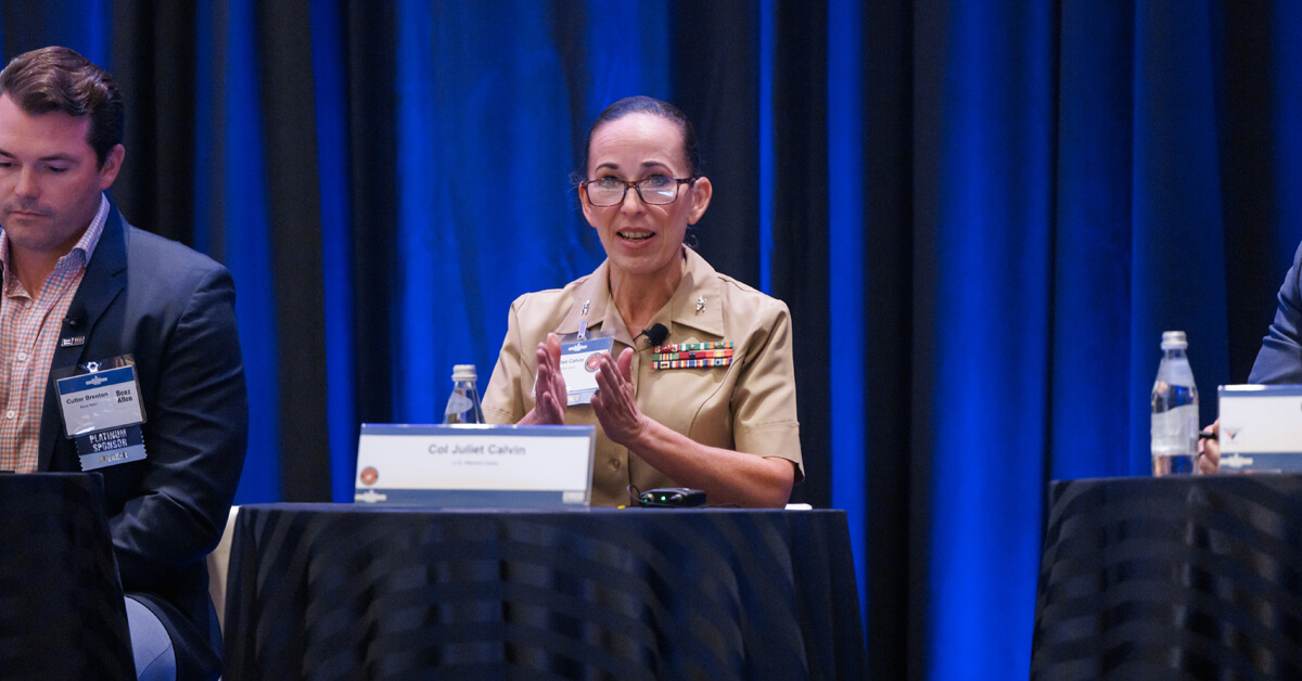 Col. Juliet Calvin. The three-decade Marine Corps official spoke at Potomac Officers Club's 2024 Navy Summit.