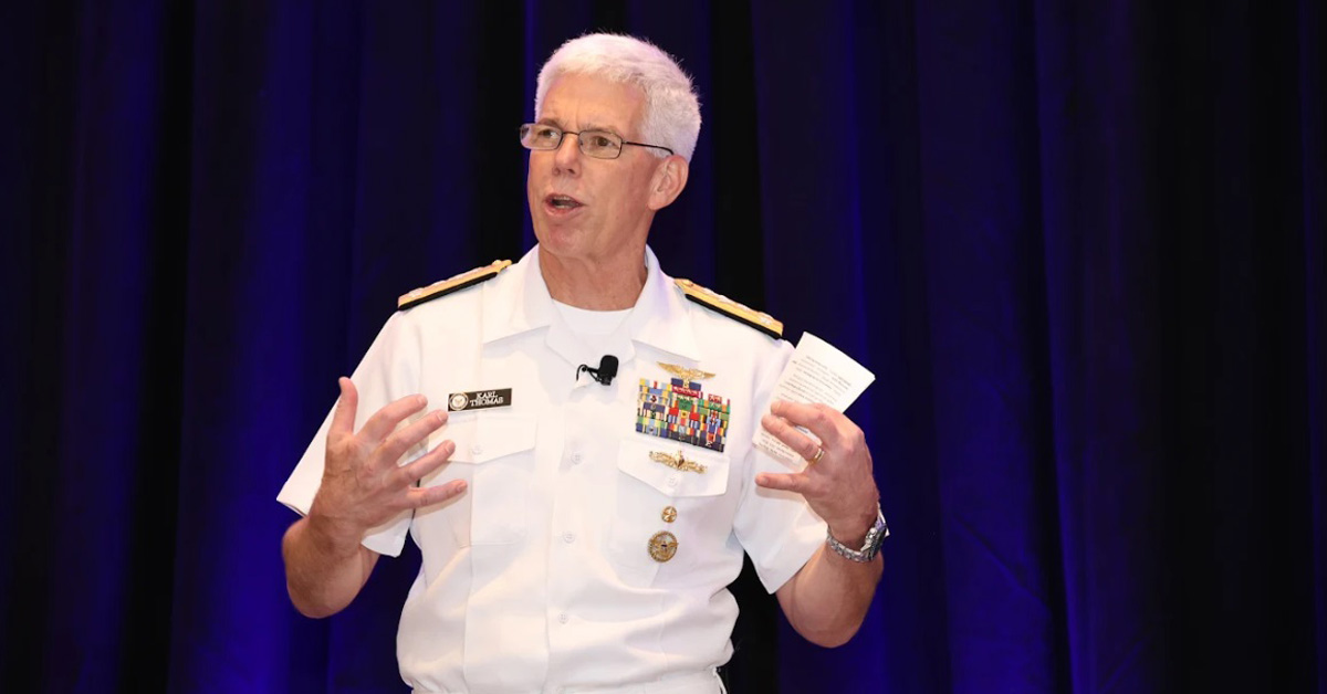 Photo of Navy Vice Adm. Karl Thomas presenting at the 2025 Navy Summit on August 26, 2025